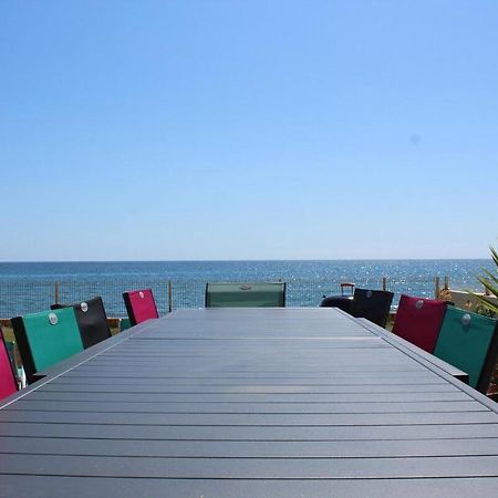 Bord de mer, pieds dans l'eau, vue panoramique Villa San-Nicolao Buitenkant foto