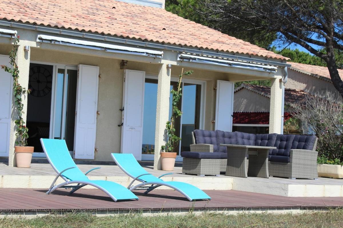 Bord de mer, pieds dans l'eau, vue panoramique Villa San-Nicolao Buitenkant foto