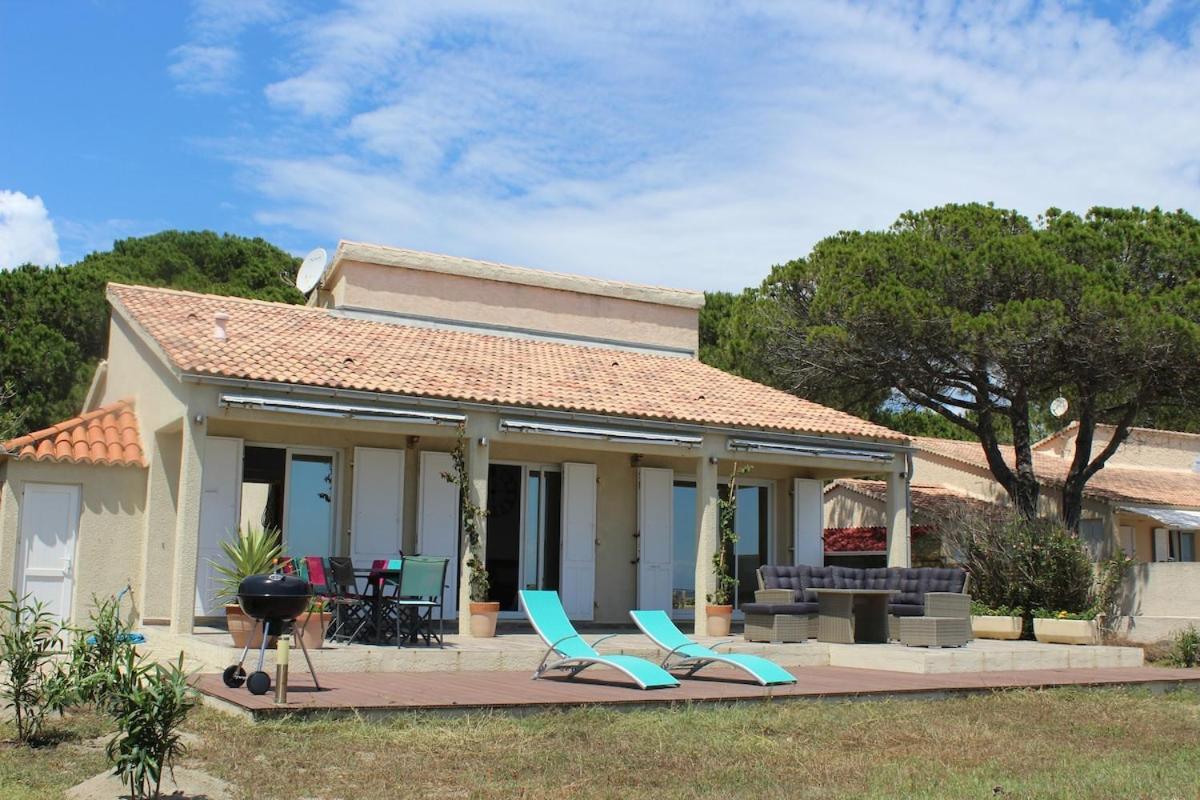 Bord de mer, pieds dans l'eau, vue panoramique Villa San-Nicolao Buitenkant foto