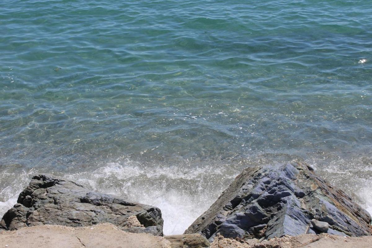 Bord de mer, pieds dans l'eau, vue panoramique Villa San-Nicolao Buitenkant foto