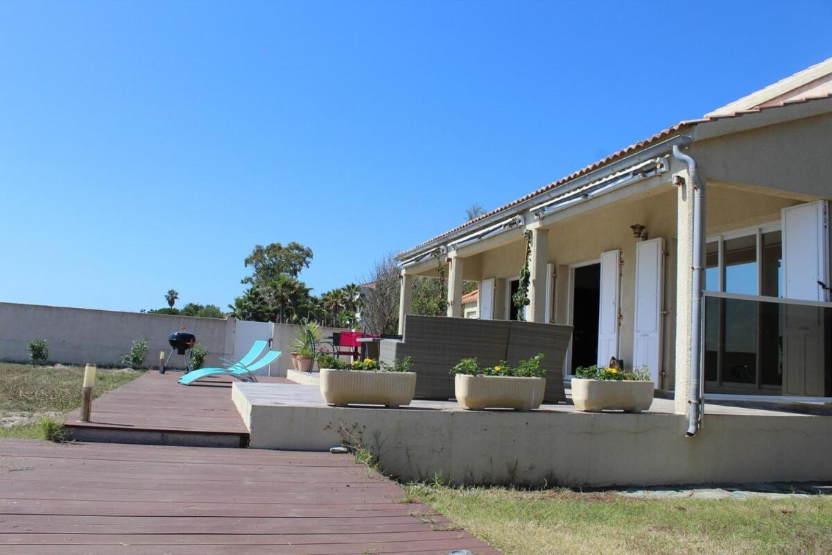 Bord de mer, pieds dans l'eau, vue panoramique Villa San-Nicolao Buitenkant foto