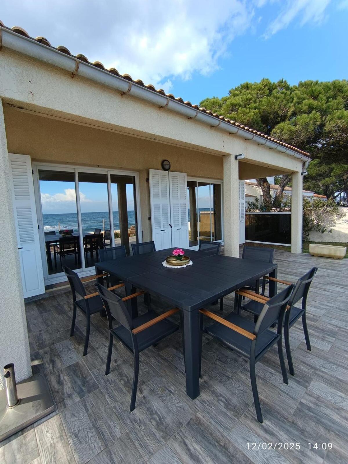 Bord de mer, pieds dans l'eau, vue panoramique Villa San-Nicolao Buitenkant foto