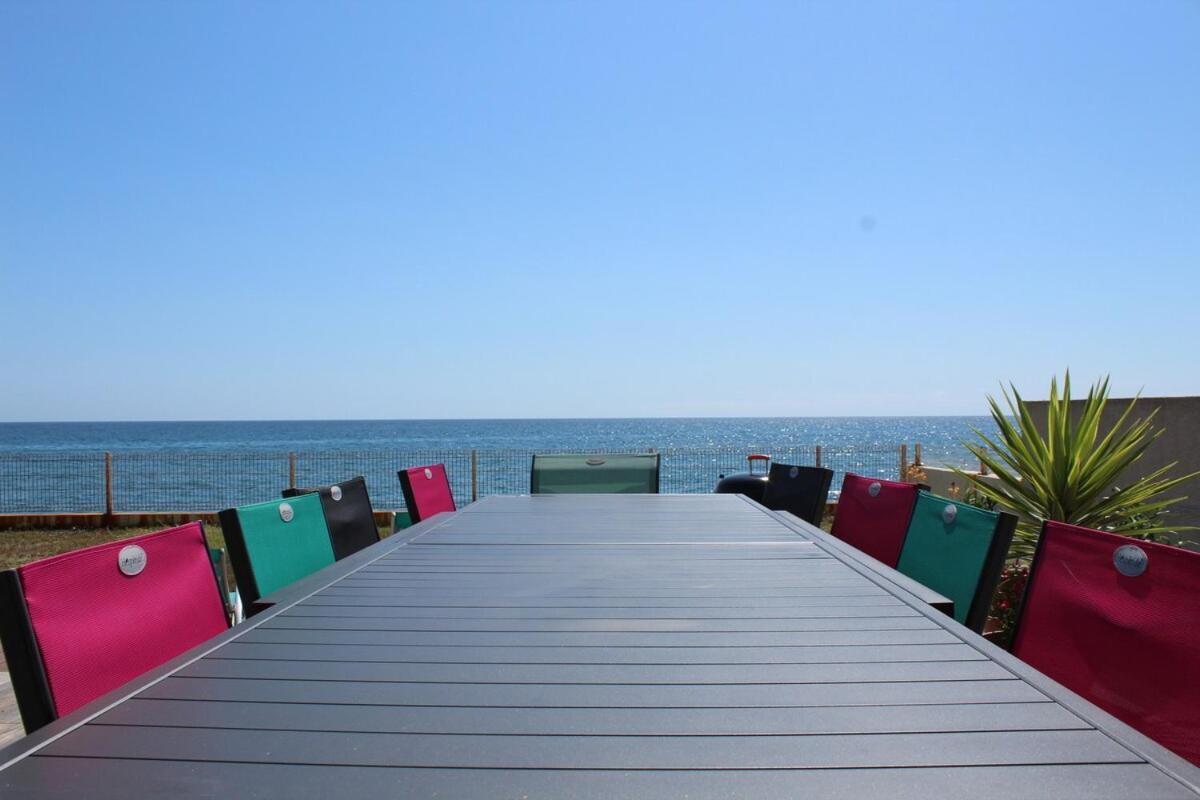 Bord de mer, pieds dans l'eau, vue panoramique Villa San-Nicolao Buitenkant foto